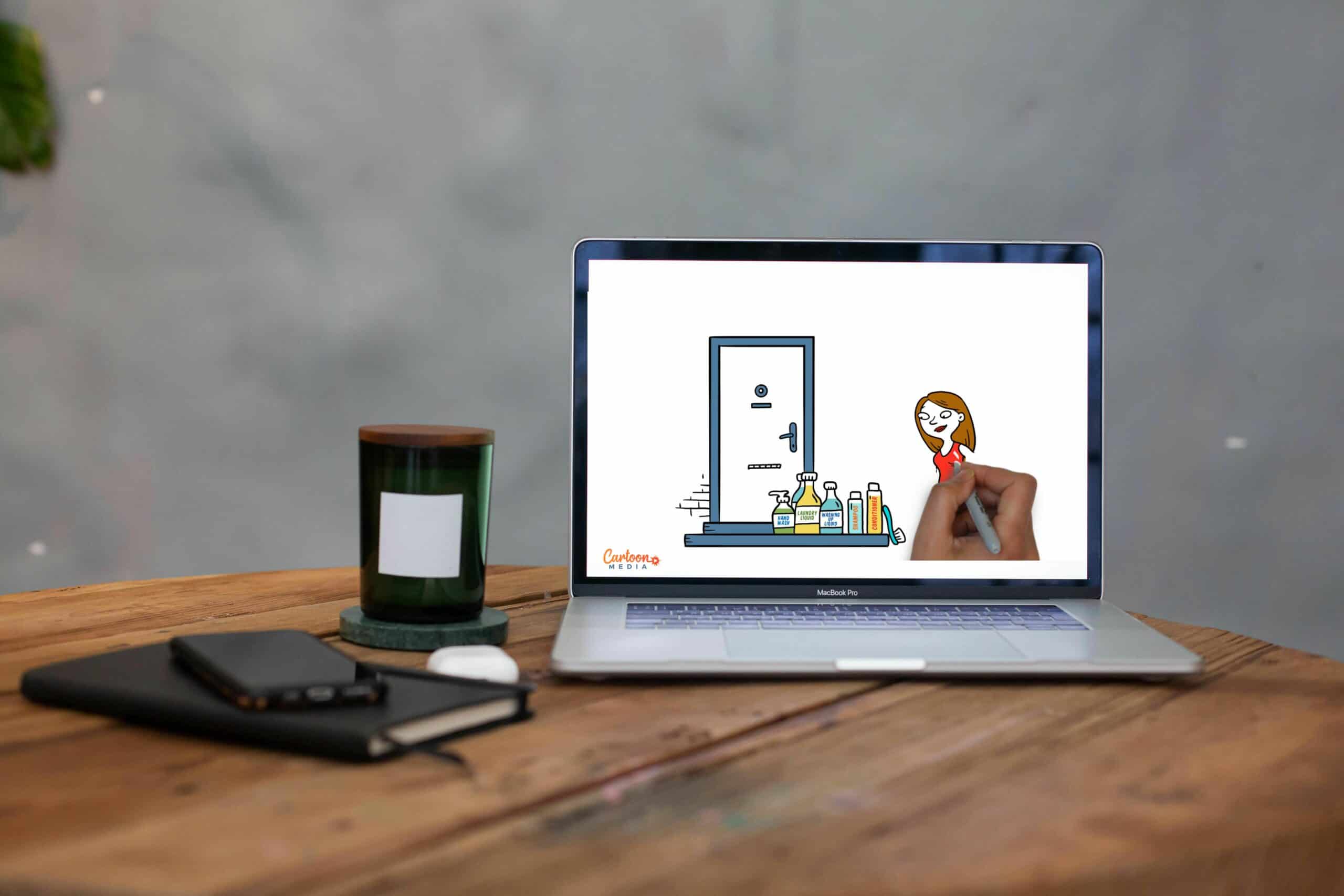 Laptop showing animated whiteboard video example for creating business-transforming explainer videos.