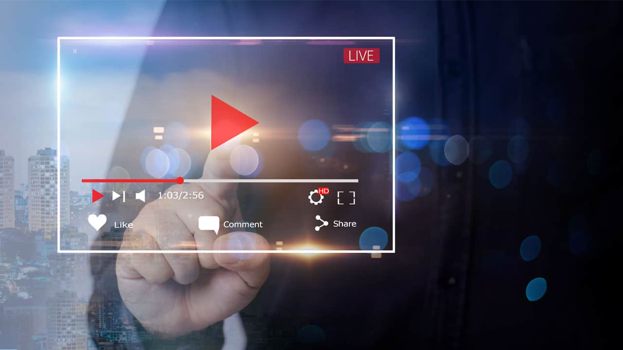 Finger pressing a play button on a virtual video player screen with "LIVE" text, symbolizing video marketing promotion.